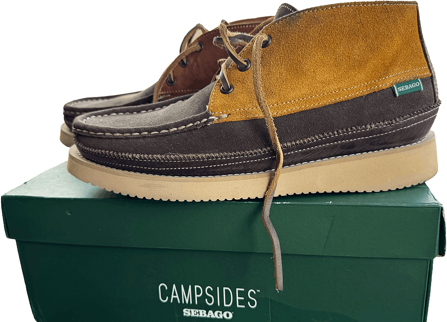 Sebago moccasins sitting atop a Sebago Campsides shoe box