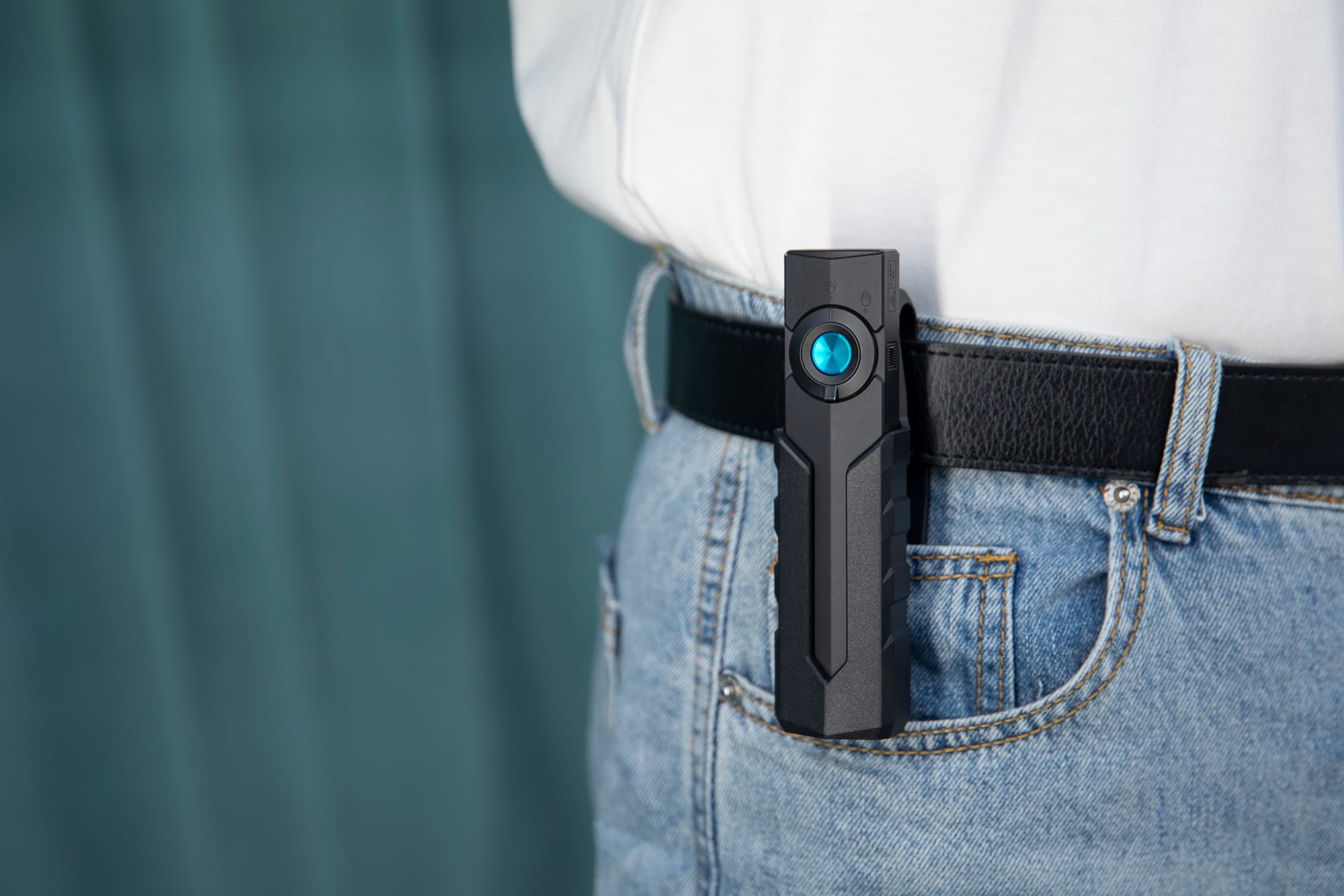 OLIGHT ArkPro holster and flashlight on a leather belt