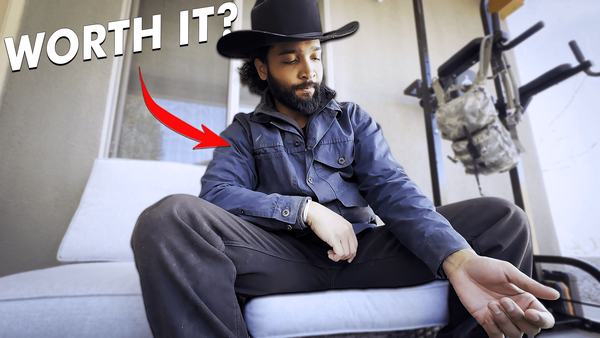 Wearing a well-used Filson short cruiser in navy