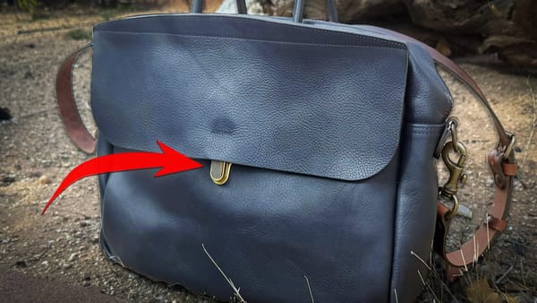 A Bleu de Chauffe leather bag outdoors