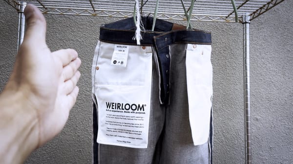 A new pair of Weirloom jeans hanging after being soaked for the first time